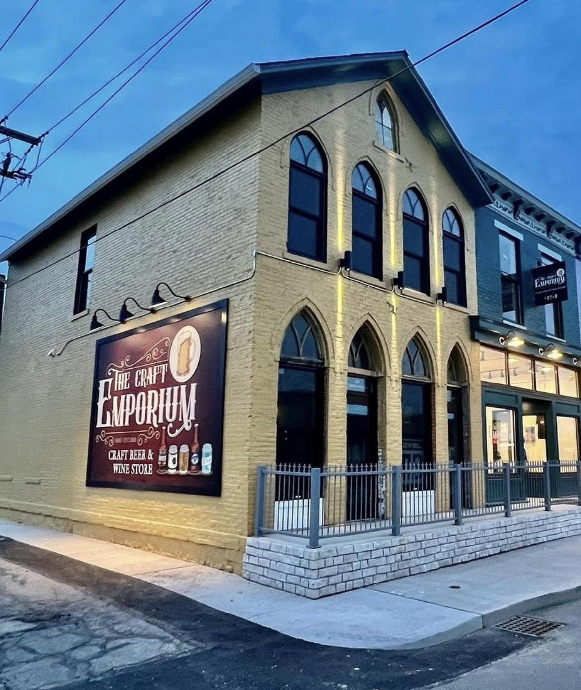 The Craft Emporium craft beer bar at dusk in Bellefontaine